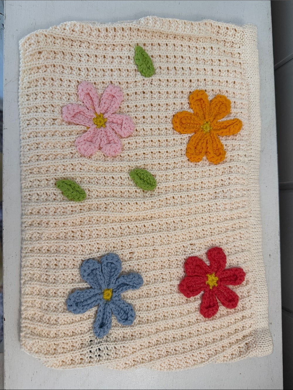 Cream Crochet Baby Blanket with Colorful Flower Appliqués